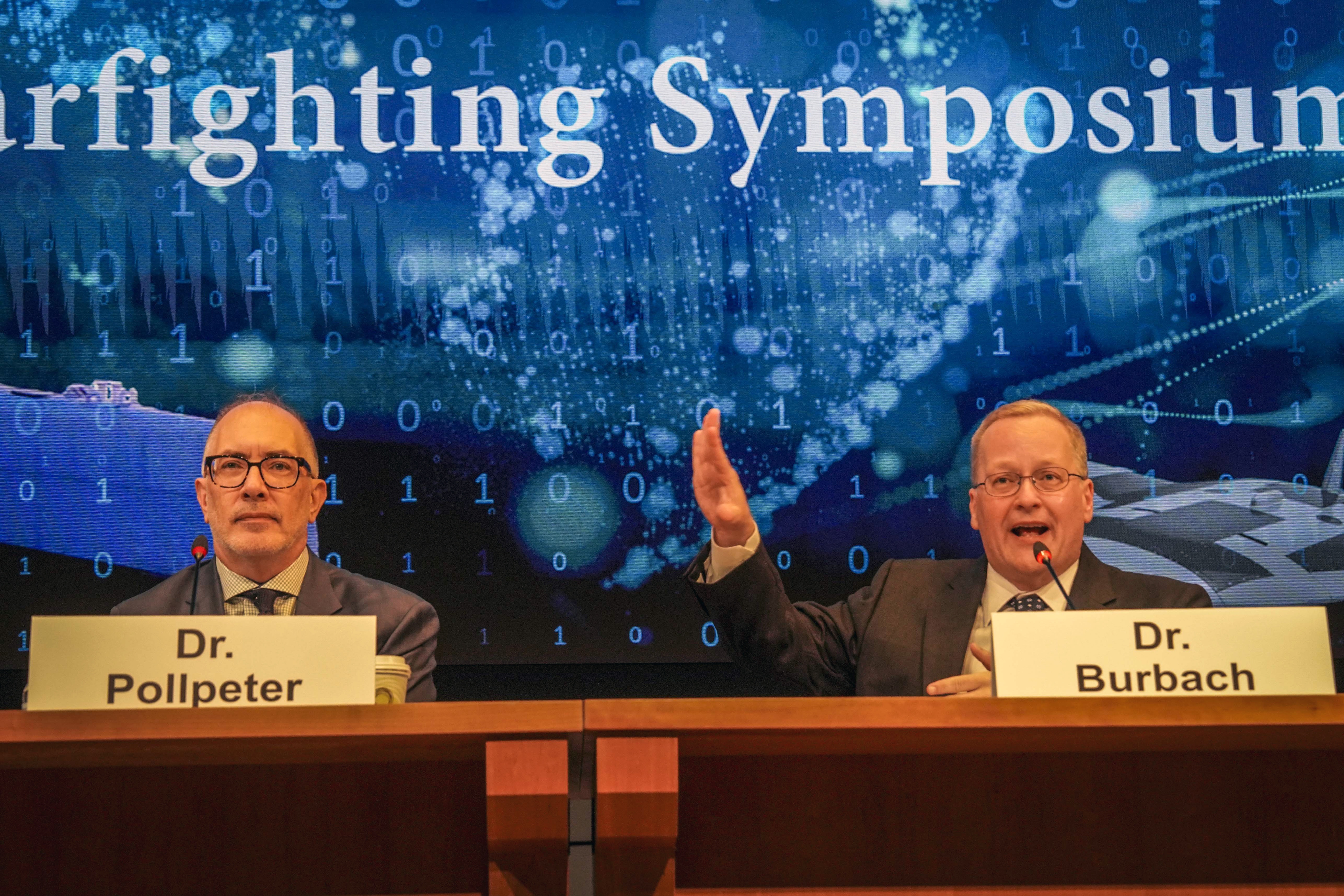 Dr. Kevin Pollpeter, Director of Research for the China Aerospace Studies Institute, and Professor David T. Burbach, Ph.D., Director of the Naval War College Space Studies Group, answer questions during Naval War College’s Future Warfighting Symposium onboard Naval Station Newport, Rhode Island, August 7, 2025 