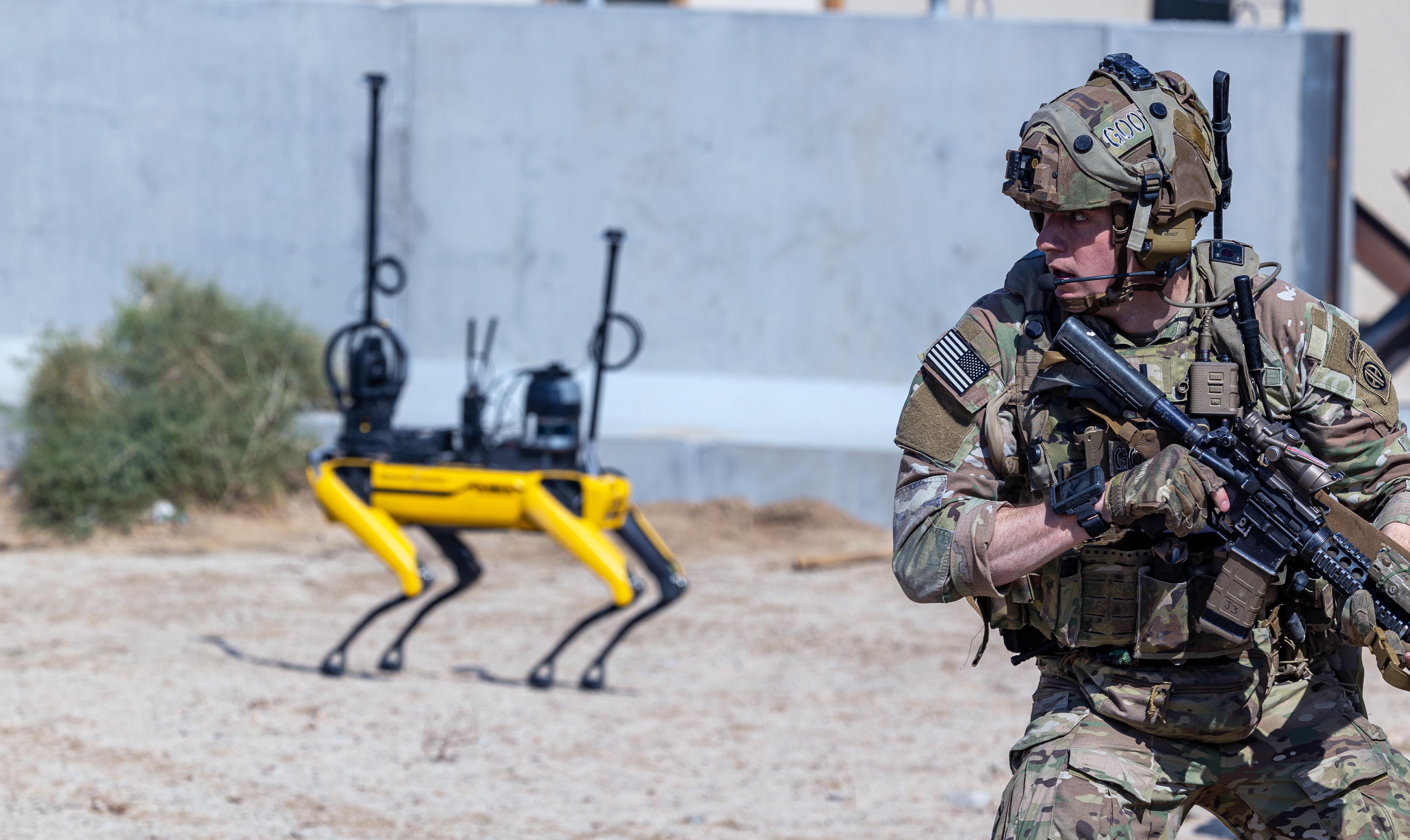 Soldier fights in tandem with various robotics in Human-Machine Integrated Formations during Project Convergence Capstone 5 experiment, March 15, 2025, at Fort Irwin, California (U.S. Army/Patrick Hunter) 